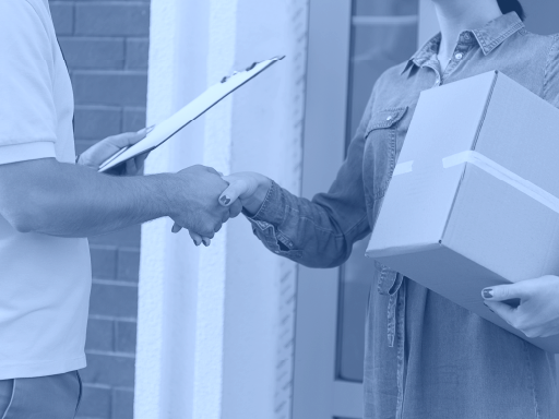 An upscale customer service concierge assisting a self-storage customer.